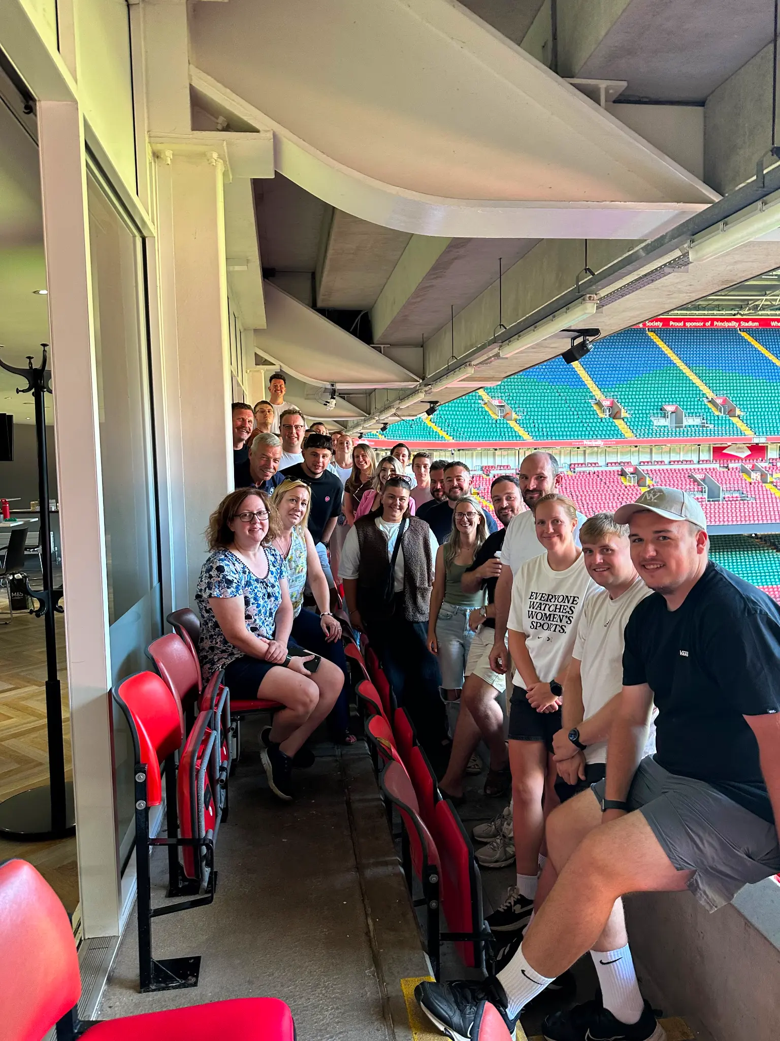 Group participants at a Crack On leadership session in a stadium setting